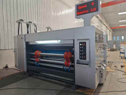 เครื่องพิมพ์อัตโนมัติ Flexo Printer Slotter พร้อมระบบแห้งที่บูรณาการ, การควบคุมความเครียดที่แม่นยําและความเร็ว 100-130m / นาทีสําหรับการพิมพ์กระดาษกล่อง